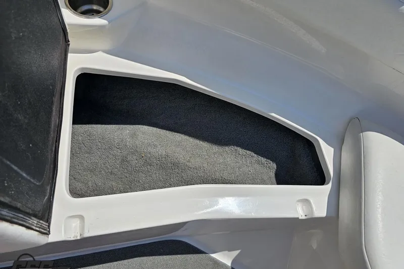 Slide: The Image of Interior storage compartment of a 2007 Regal 2000 Bowrider boat. - 86