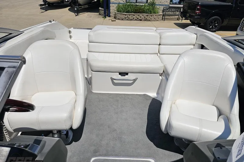 Slide: The Image of 2007 Regal 2000 Bowrider interior with white seating and gray carpet. - 88