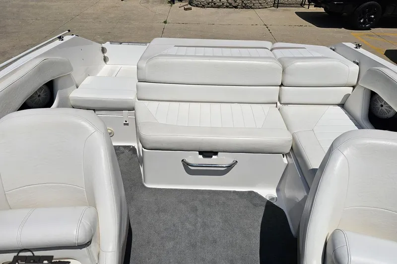 Slide: The Image of 2007 Regal 2000 Bowrider interior with white seating and carpeted floor. - 89