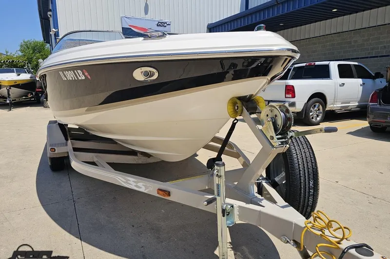 Slide: The Image of 2007 Regal 2000 Bowrider on trailer in parking lot, front view. - 9