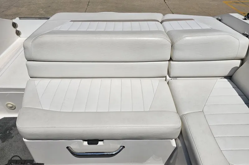 Slide: The Image of White leather seating on a 2007 Regal 2000 Bowrider boat, showcasing comfort and style. - 95