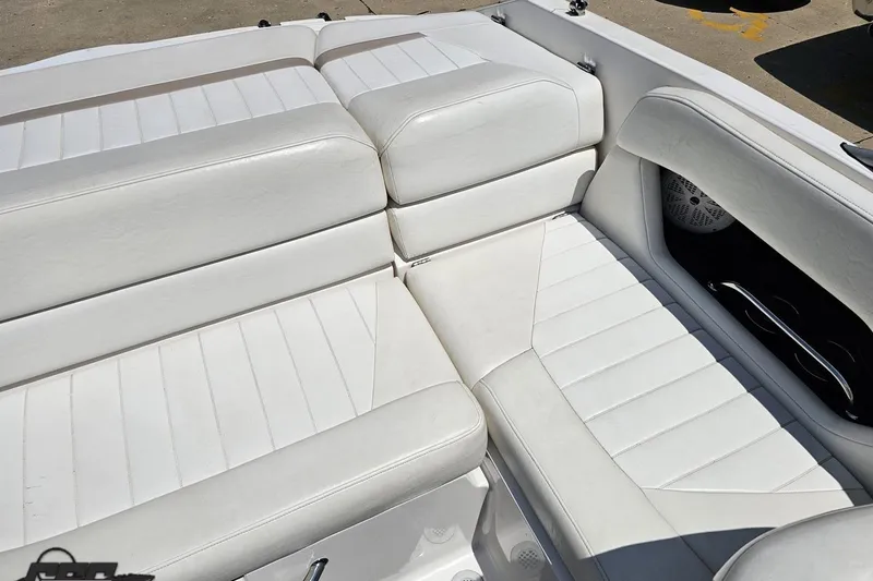 Slide: The Image of 2007 Regal 2000 Bowrider boat interior with white leather seating. - 97