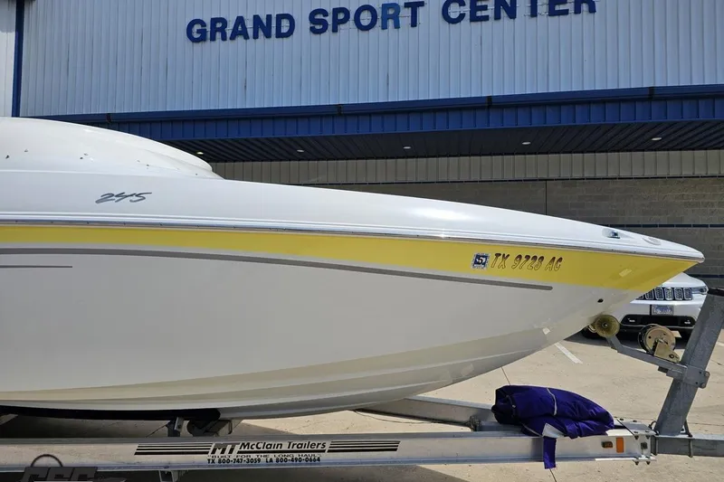 Slide: The Image of 2005 Baja 245 boat on trailer at Grand Sport Center. - 12