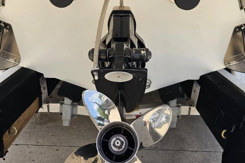 Slide: The Image of Rear view of a 2005 Baja 245 boat showing the propeller and outdrive. - 29