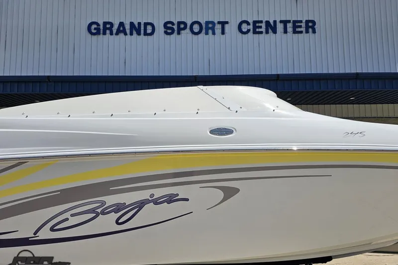 Slide: The Image of 2005 Baja 245 boat at Grand Sport Center, featuring sleek design and vibrant graphics. - 3