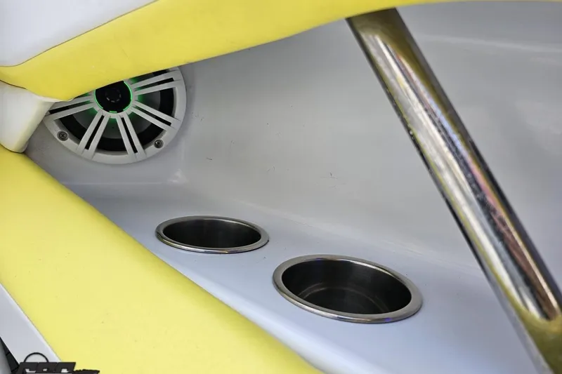 Slide: The Image of Interior of 2005 Baja 245 boat with speaker and cup holders. - 48