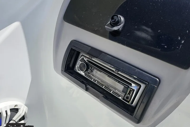 Slide: The Image of Kenwood stereo system in 2005 Baja 245 boat dashboard. - 60