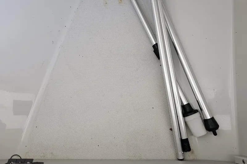 Slide: The Image of Aluminum poles on a 2005 Baja 245 boat deck. - 73