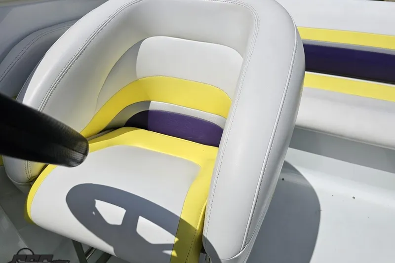 Slide: The Image of White, yellow, and purple boat seat in 2005 Baja 245 model. - 78