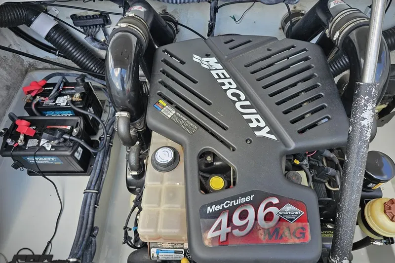 Slide: The Image of Engine compartment of a 2005 Baja 245 with Mercury MerCruiser 496 MAG engine. - 85