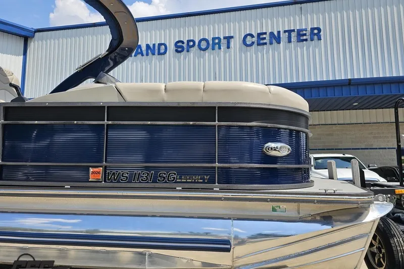 Slide: The Image of 2016 Manitou 23 Legacy pontoon boat at Island Sport Center. - 13