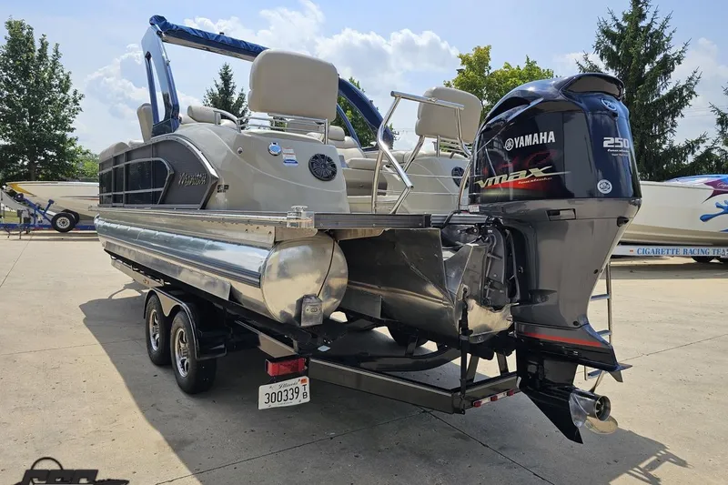 Slide: The Image of 2016 Manitou 23 Legacy pontoon boat with Yamaha VMAX 250 engine on trailer. - 43
