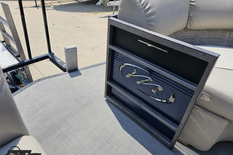 Slide: The Image of 2016 Manitou 23 Legacy boat interior with luxury seating and stylish design elements. - 84