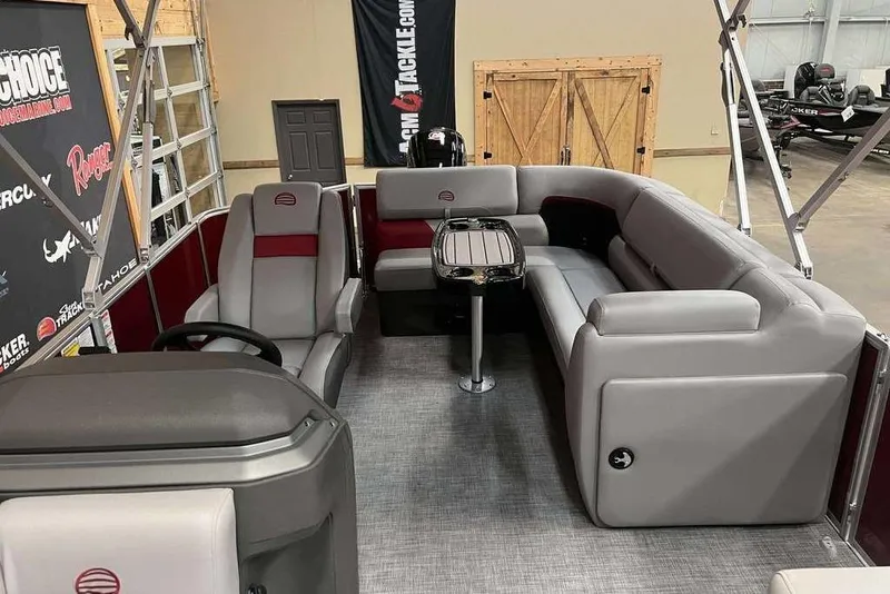 Slide: The Image of 2026 Sun Tracker PARTY BARGE® 20 DLX interior with plush seating and sleek design. - 7