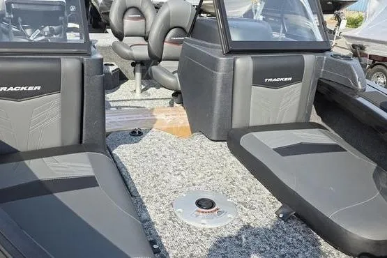 Slide: The Image of 2026 Tracker Targa V18 Combo boat interior with seating and console details. - 10