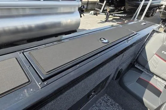 Slide: The Image of 2026 Tracker Targa V18 Combo boat interior with seating and storage compartments. - 11