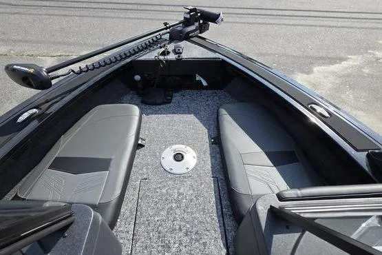 Slide: The Image of 2026 Tracker Targa V18 Combo boat interior with seating and fishing equipment. - 15