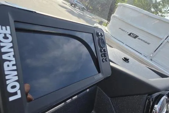 Slide: The Image of Lowrance fish finder on 2026 Tracker Targa V18 Combo boat dashboard. - 16