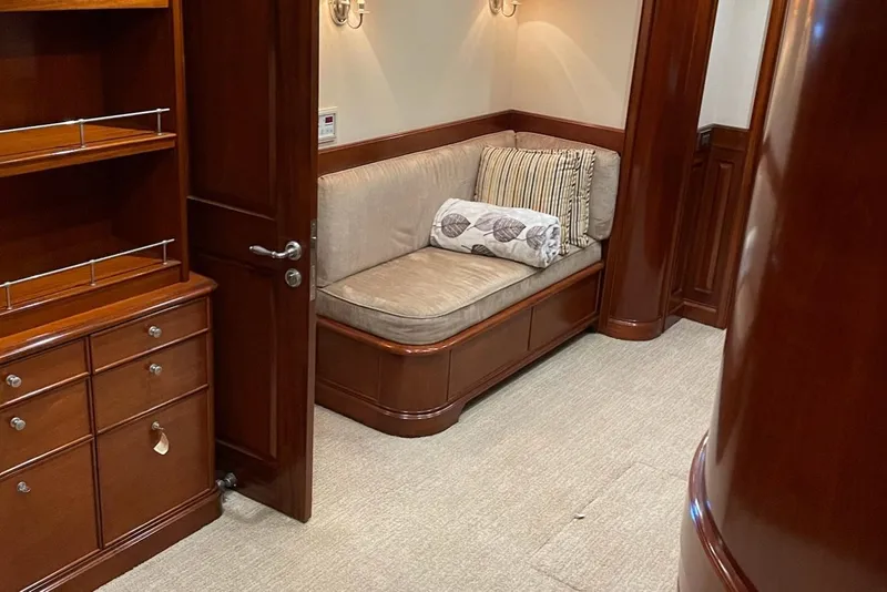 Slide: The Image of Luxurious kitchen interior on 2001 Rayburn Flush Deck yacht with wood paneling and modern appliances. - 11