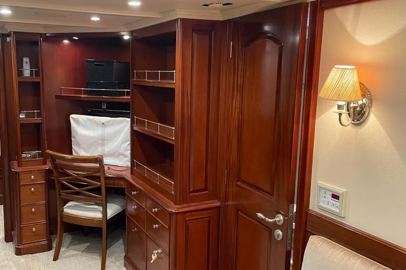 Slide: The Image of Luxurious kitchen on 2001 Rayburn Flush Deck yacht with stainless steel appliances and lake view. - 12