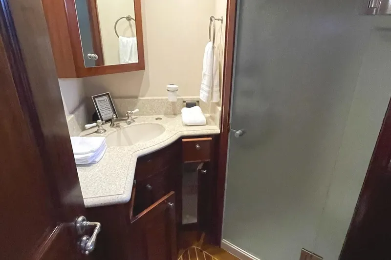 Slide: The Image of Luxurious 2001 Rayburn Flush Deck yacht interior with navigation controls and panoramic windows. - 18