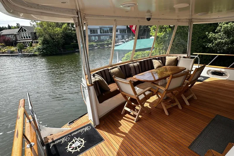 Slide: The Image of Luxurious wooden interior of 2001 Rayburn Flush Deck yacht with elegant cabinetry and bathroom. - 27