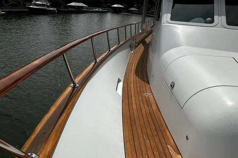 Slide: The Image of Luxurious 2001 Rayburn Flush Deck interior with elegant wood cabinetry and nautical door. - 30
