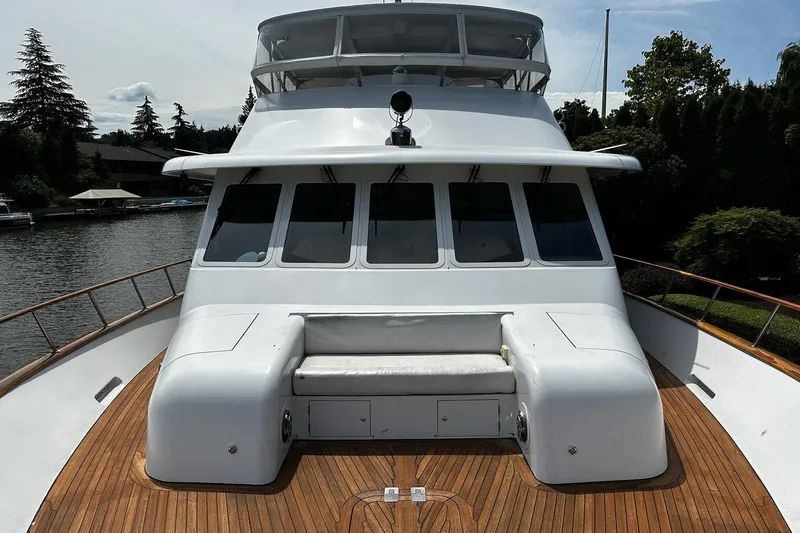 Slide: The Image of Luxurious Rayburn Flush Deck 2001 yacht interior with wooden cabinetry and office space. - 32