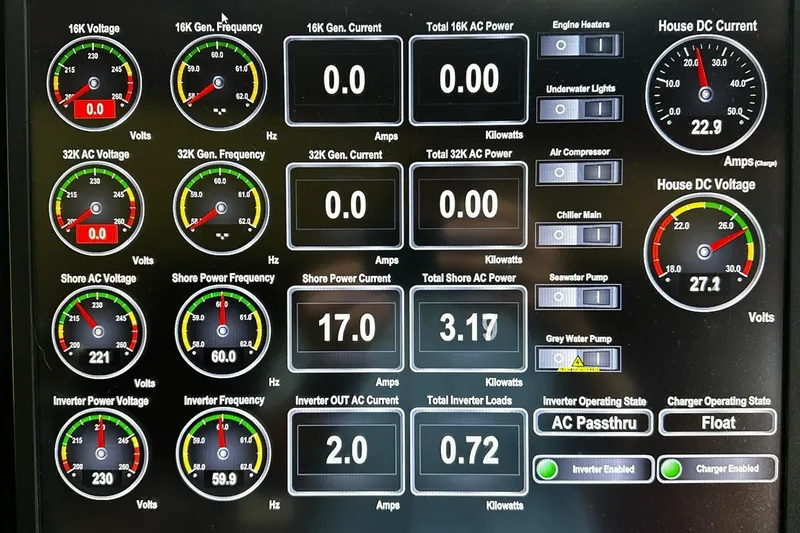 Slide: The Image of Helm of 2001 Rayburn Flush Deck yacht with navigation equipment and ocean view. - 42
