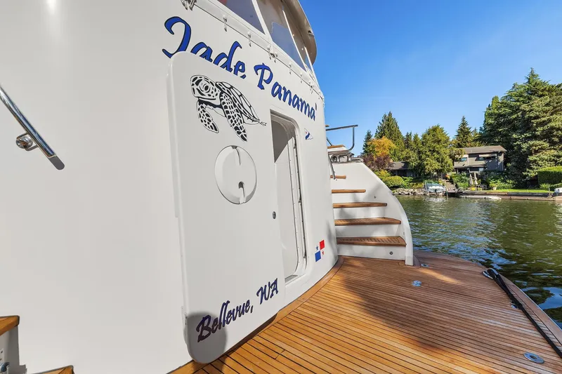 Slide: The Image of Luxurious 2001 Rayburn Flush Deck yacht cruising on a sunny day. - 65