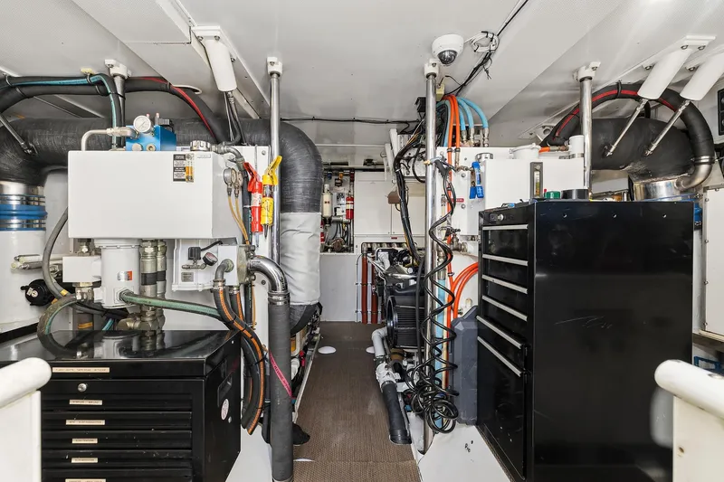 Slide: The Image of 2001 Rayburn Flush Deck yacht on serene lake with clear blue sky. - 66