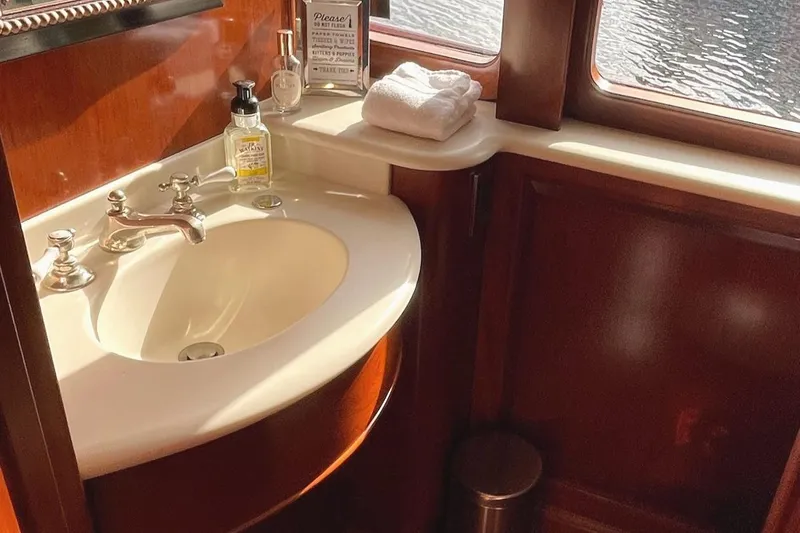 Slide: The Image of Luxurious interior of 2001 Rayburn Flush Deck yacht with elegant wood finish and scenic water view. - 7