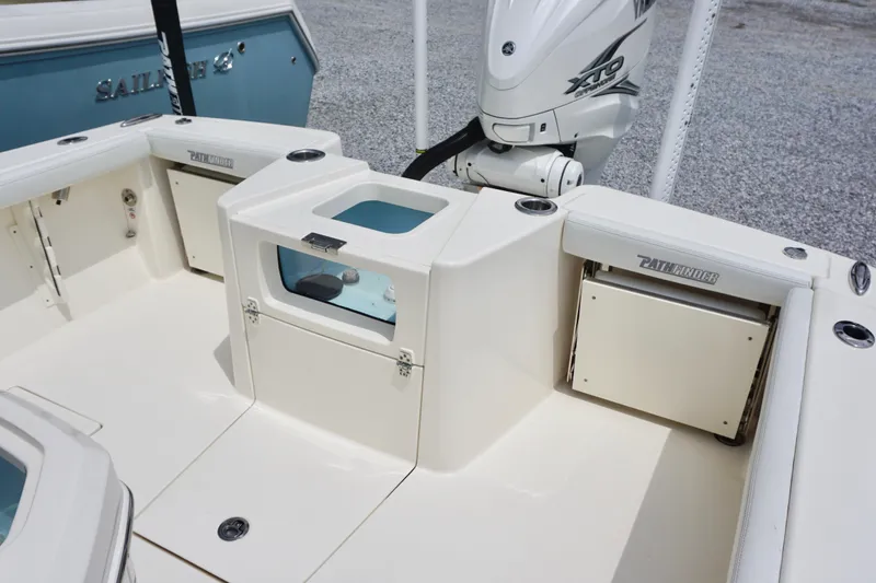 Slide: The Image of 2024 Pathfinder 2700 Open boat interior with Yamaha XTO engine, featuring storage and seating. - 17