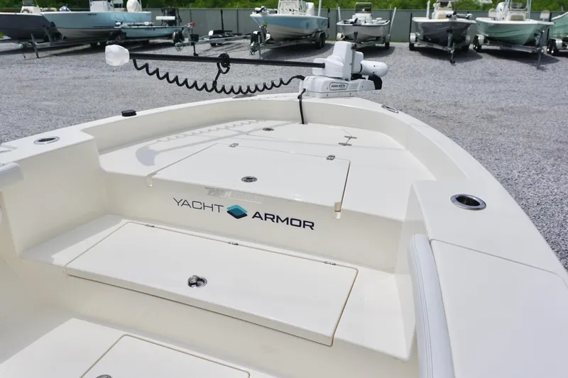 Slide: The Image of 2024 Pathfinder 2700 Open boat with Yacht Armor, parked on gravel lot. - 8