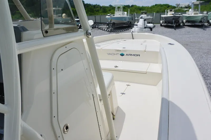 Slide: The Image of 2024 Pathfinder 2700 Open boat with Yacht Armor, docked in a marina. - 9