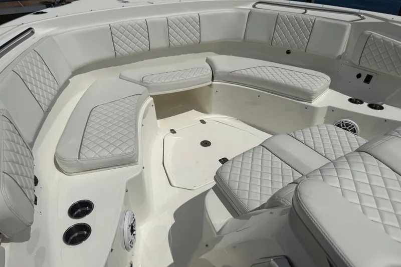 Slide: The Image of Luxurious seating area on 2022 Pursuit S 378 Sport boat with quilted upholstery. - 15