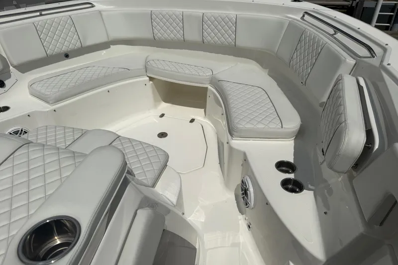 Slide: The Image of Luxurious seating area on 2022 Pursuit S 378 Sport boat with quilted upholstery. - 18