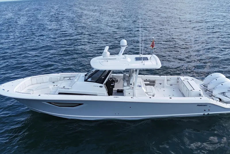Slide: The Image of 2022 Pursuit S 378 Sport boat on open water, side view. - 4