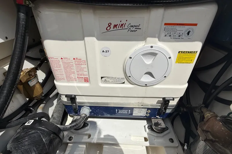 Slide: The Image of Engine compartment of 2022 Pursuit S 378 Sport boat with 8 Mini Compact Power unit. - 62