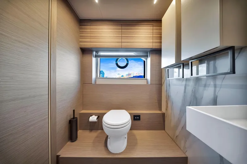 Slide: The Image of Luxurious bathroom interior of 2022 Ferretti Yachts 670 with modern design and ocean view. - 48