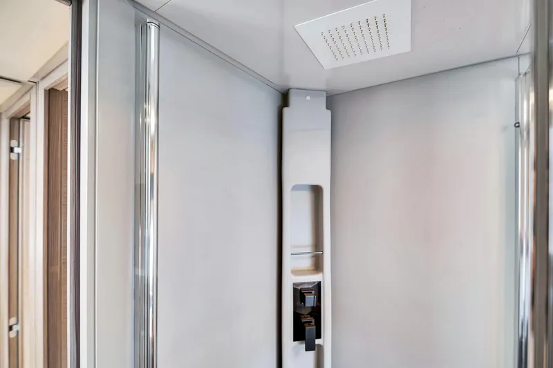 Slide: The Image of Modern shower interior on 2022 Ferretti Yachts 670, featuring sleek design and fixtures. - 58