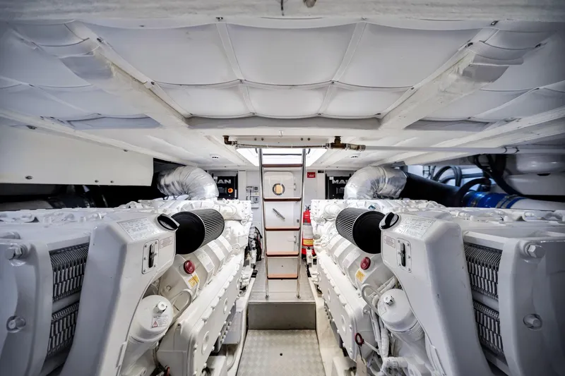 Slide: The Image of Engine room of 2022 Ferretti Yachts 670, featuring advanced machinery and equipment. - 64