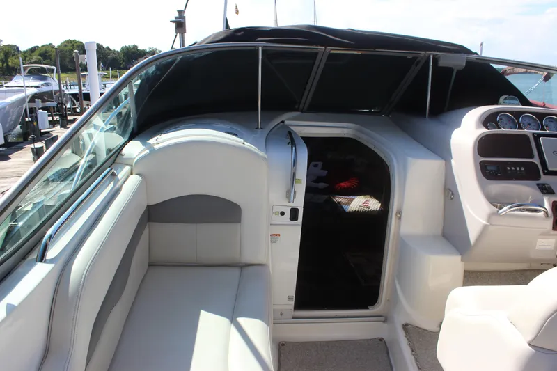 Slide: The Image of 2007 Chaparral Signature 310 boat interior with seating and dashboard view. - 31