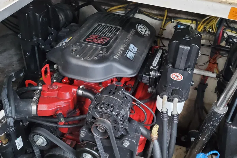 Slide: The Image of Engine compartment of 2007 Chaparral Signature 310 boat, featuring a 5.0L V8 engine. - 46