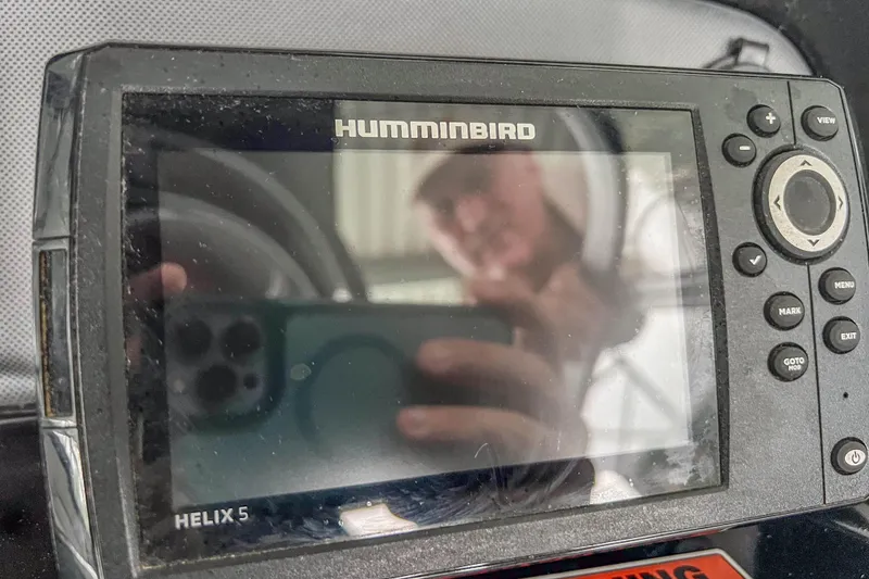 Slide: The Image of Humminbird Helix 5 fish finder on 2023 Yamaha AR190 boat dashboard. - 21