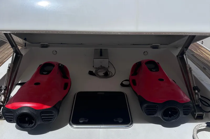 Slide: The Image of Storage compartment on a 2020 Fjord 44 Open yacht with two red underwater scooters. - 10