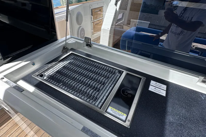 Slide: The Image of Outdoor grill on 2020 Fjord 44 Open yacht, featuring sleek design and modern amenities. - 19