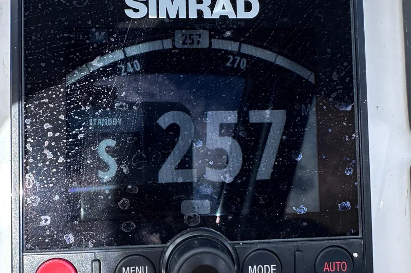 Slide: The Image of Simrad navigation display on 2020 Fjord 44 Open, showing heading 257 degrees. - 28