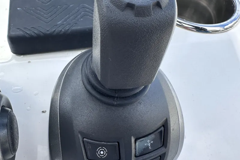 Slide: The Image of Joystick control on a 2020 Fjord 44 Open yacht dashboard. - 31