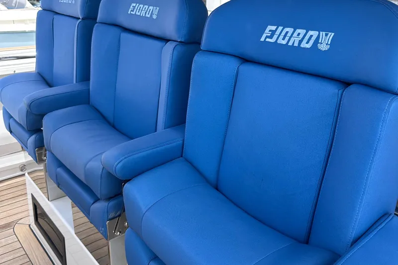 Slide: The Image of Blue seating on 2020 Fjord 44 Open yacht, showcasing luxury and comfort. - 37